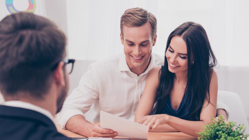 A couple meeting with a Fayetteville Georgia family lawyer.