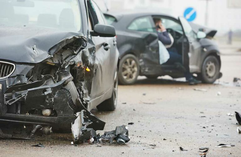 A car wreck involving two vehicles.