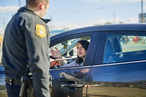 Woman Getting a Traffic Ticket