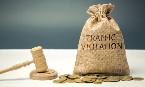 Does a Traffic Ticket Affect Your Car Accident Claim in Georgia? Traffic Violation Concept