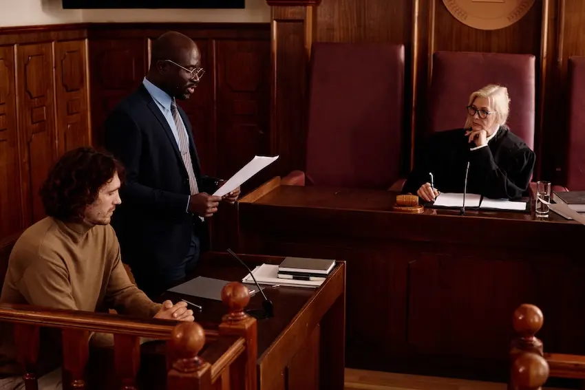 How Are Punitive Damages Awarded in a Georgia Car Accident Case? Jury in courtroom deciding punitive damages case against reckless Georgia driver